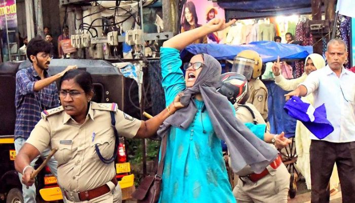 Kerala: Police pulls Aysha Renna with her hijab for protesting against bulldozer action in UP