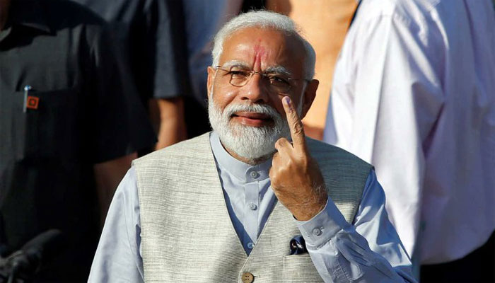 ANI on X: Ahmedabad, Gujarat  Prime Minister Narendra Modi greets people  on his way to Nishan Public school, Ranip to cast his vote for Gujarat  Assembly elections. #GujaratElections  / X