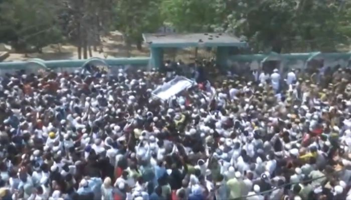 Thousands gather and chant slogans in support of gangster Mukhtar Ansari during his burial in Ghazipur