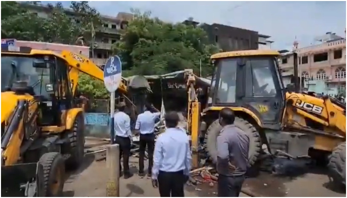 Surat govt imposes bulldozer action razing illegal encroachments in area where stones were pelted at Ganesh Pandal yesterday, details