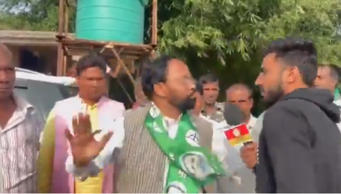 JMM leader Nijamuddin Ansari tries to slap journalist, watch video